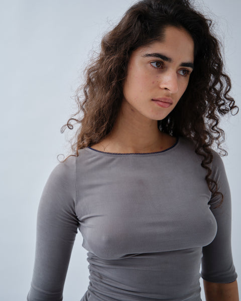 Women wearing ribbed grey 3/4 sleeve boatneck